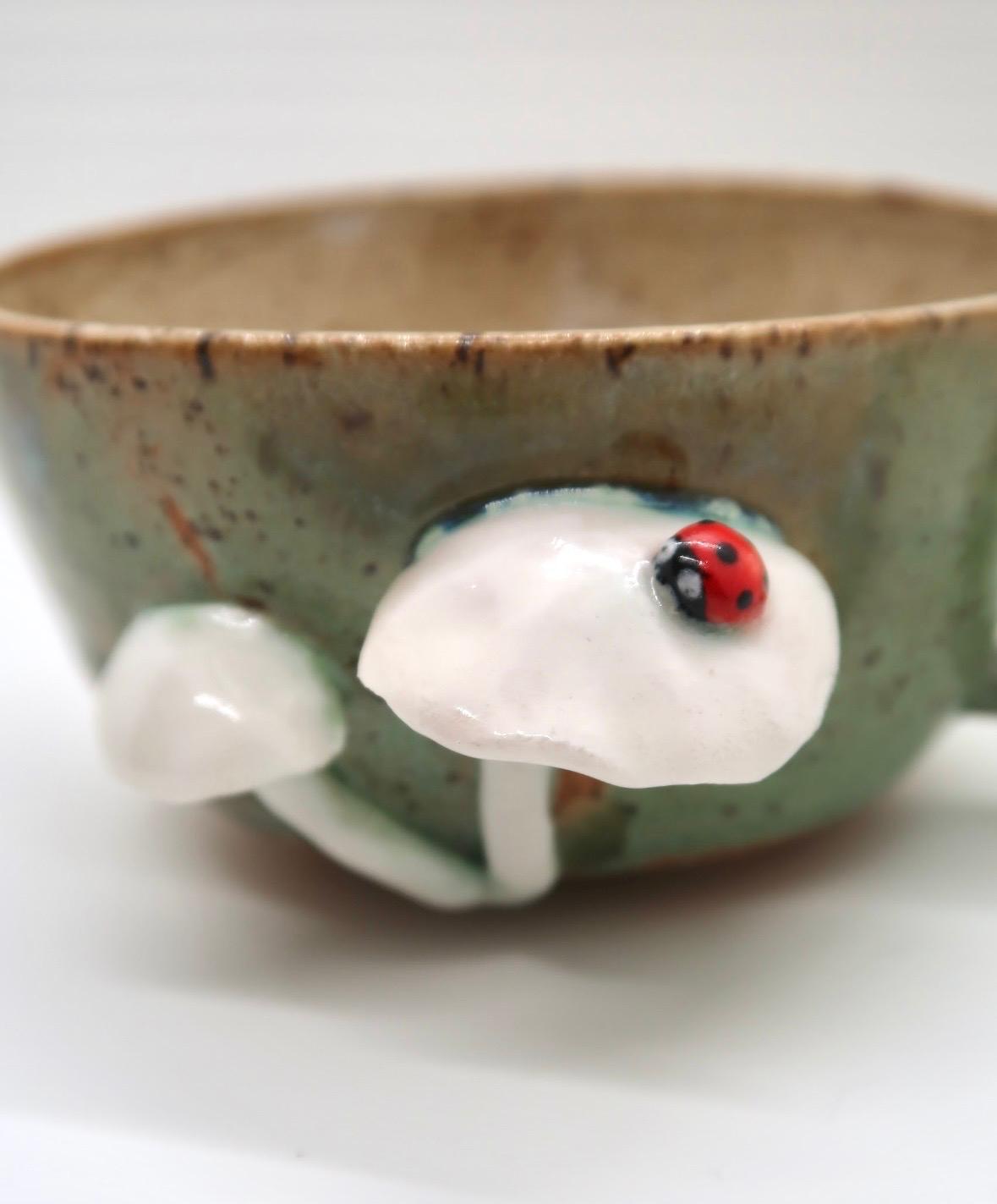 LADYBUG ON WHITE MUSHROOMS